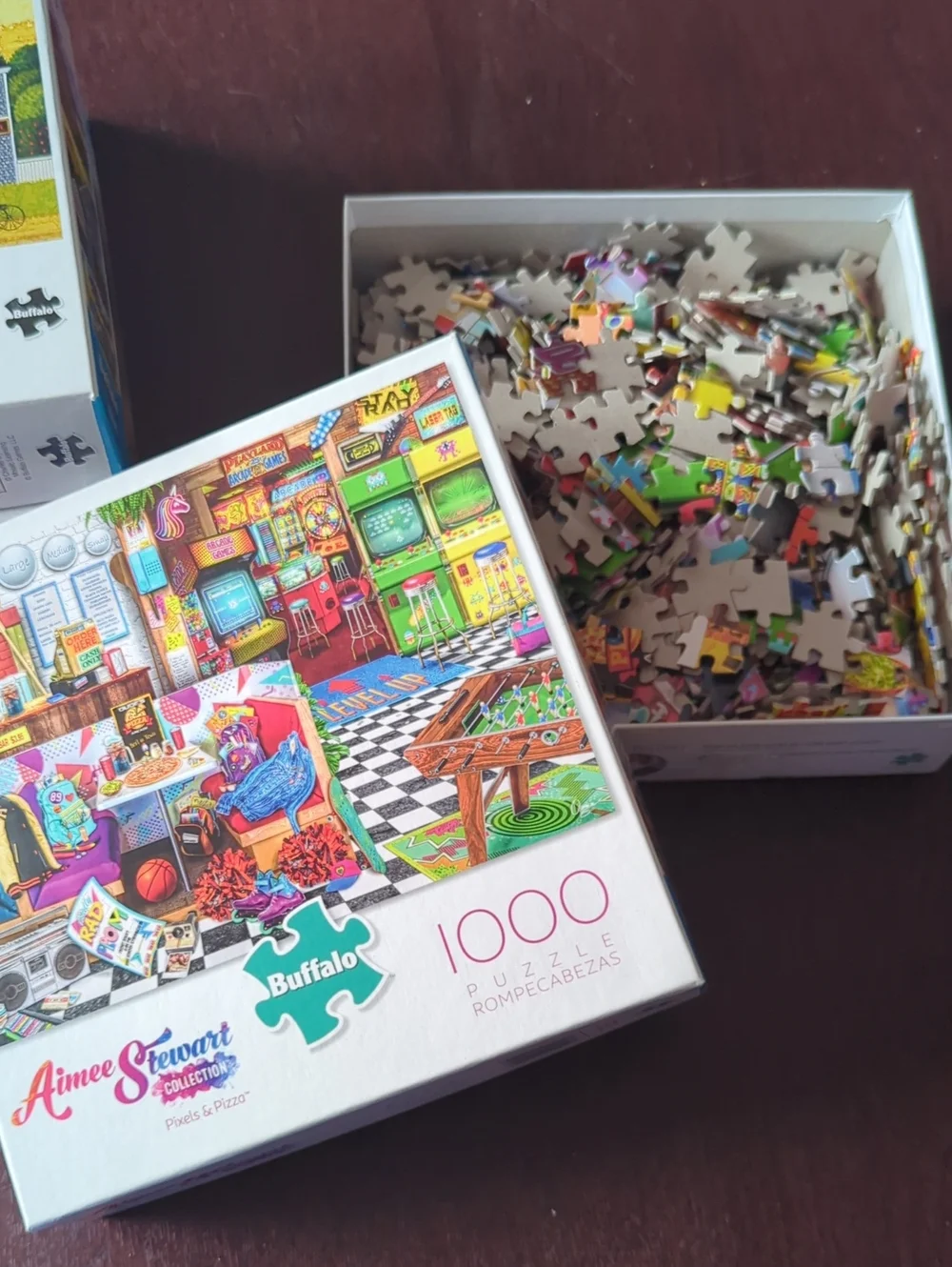 (3) Buffalo Games and Puzzles 1000pc Puzzles. See pictures